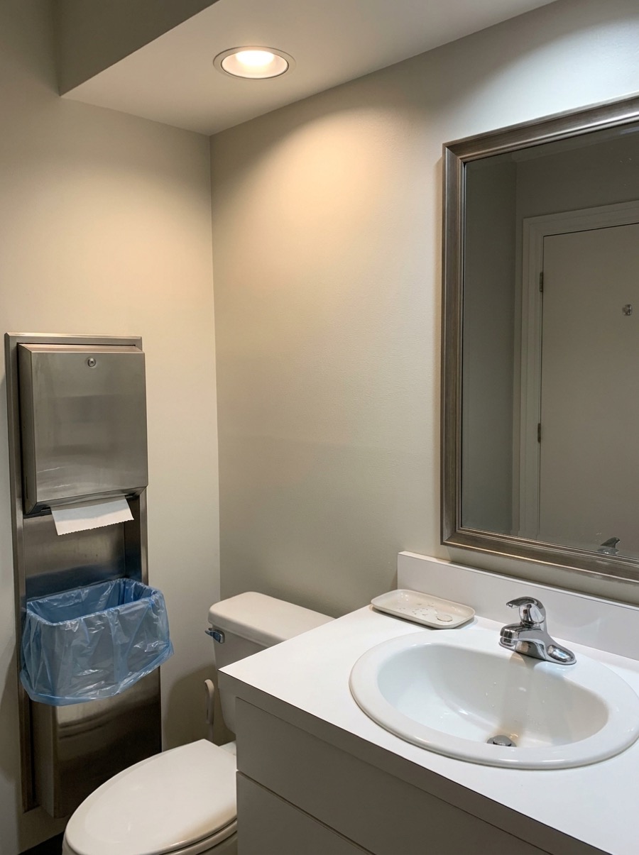 A clean, well-maintained office bathroom